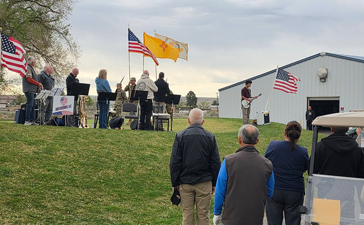Golfers observing event on golf course